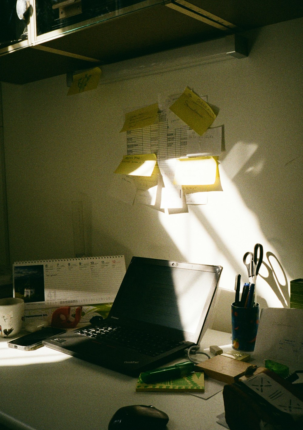 Organized desk with sticky notes